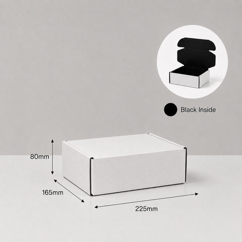 White box with dimensions and with black inside