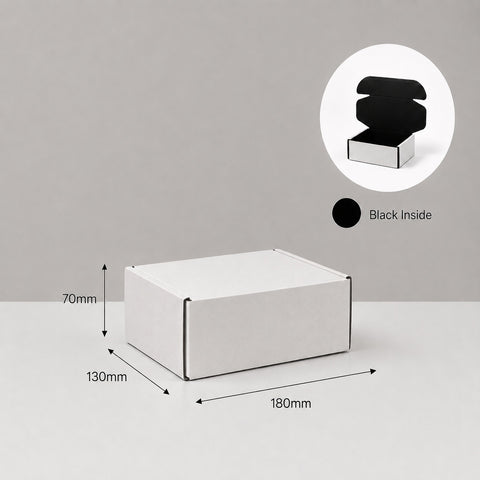 White box with dimensions and black inside