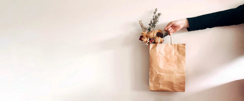 brown paper bag with flowers banner