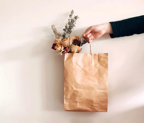 brown paper bag with flowers